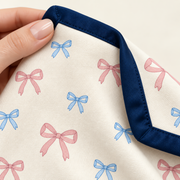 Close up of the JOWI Baby Blanket worn, with the printed cloth at true scale