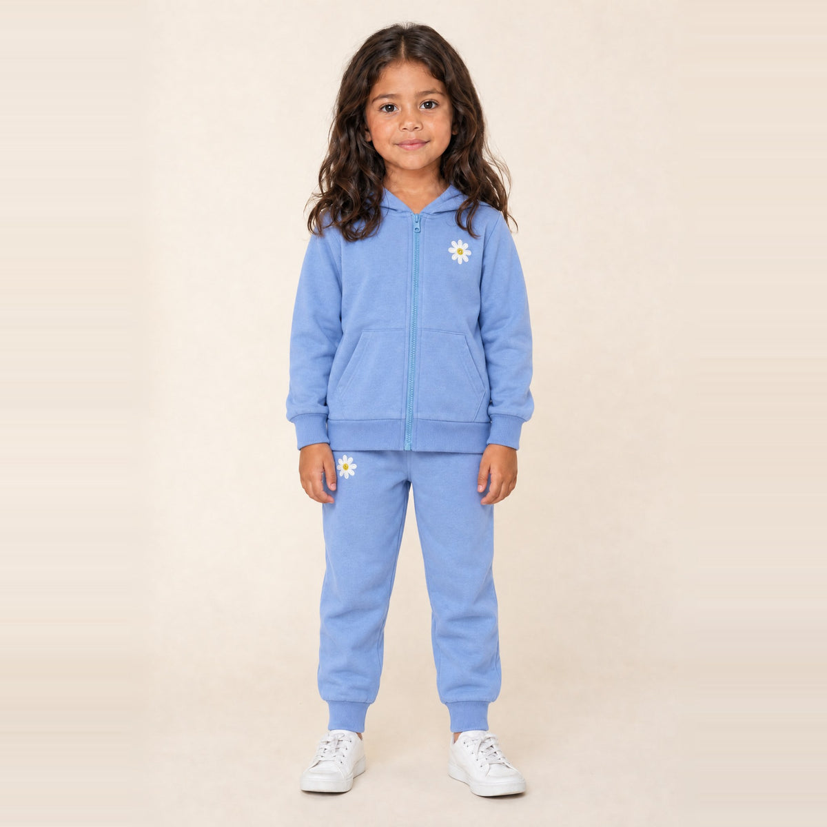 Girl standing in the JOWI Blue Daisy Hoodie & Jogger Set, size 4T-6T