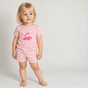 A girl standing in the JOWI Cherry Bow Tee & Short Set, full body on a plain studio background