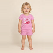 Little girl standing in the JOWI Cherry Bow Tee & Short Set, size 2T-3T