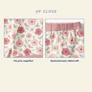 Close up of the JOWI Pink Floral Pajama Set: the printed cloth magnified next to a construction detail